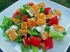 Салат с курицей, помидорами, зеленью и сырным соусом
